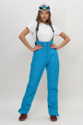 Оптом Полукомбинезон брюки горнолыжные женские голубого цвета 66789Gl в Казани, фото 2