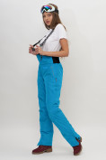 Оптом Полукомбинезон брюки горнолыжные женские голубого цвета 66789Gl в Казани, фото 3