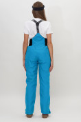 Оптом Полукомбинезон брюки горнолыжные женские голубого цвета 66789Gl в Казани, фото 4