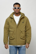 Оптом Куртка молодежная мужская весенняя с капюшоном горчичного цвета 7311G в Оренбурге