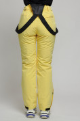Оптом Горнолыжный костюм женский желтого цвета 77039J в Казани, фото 24
