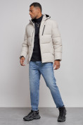 Оптом Куртка зимняя молодежная мужская с капюшоном светло-бежевого цвета 8320SB в Екатеринбурге, фото 2