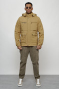 Оптом Куртка спортивная мужская весенняя с капюшоном бежевого цвета 88029B в Казани