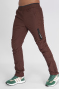 Оптом Утепленные спортивные брюки мужские коричневого цвета 882116K в Казани, фото 9
