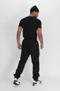 Оптом Утепленные спортивные брюки мужские черного цвета 882198Ch в Казани, фото 16
