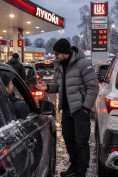 Оптом Мужская зимняя стёганая куртка с графеновой подкладкой серого цвета 9651Sr, фото 3